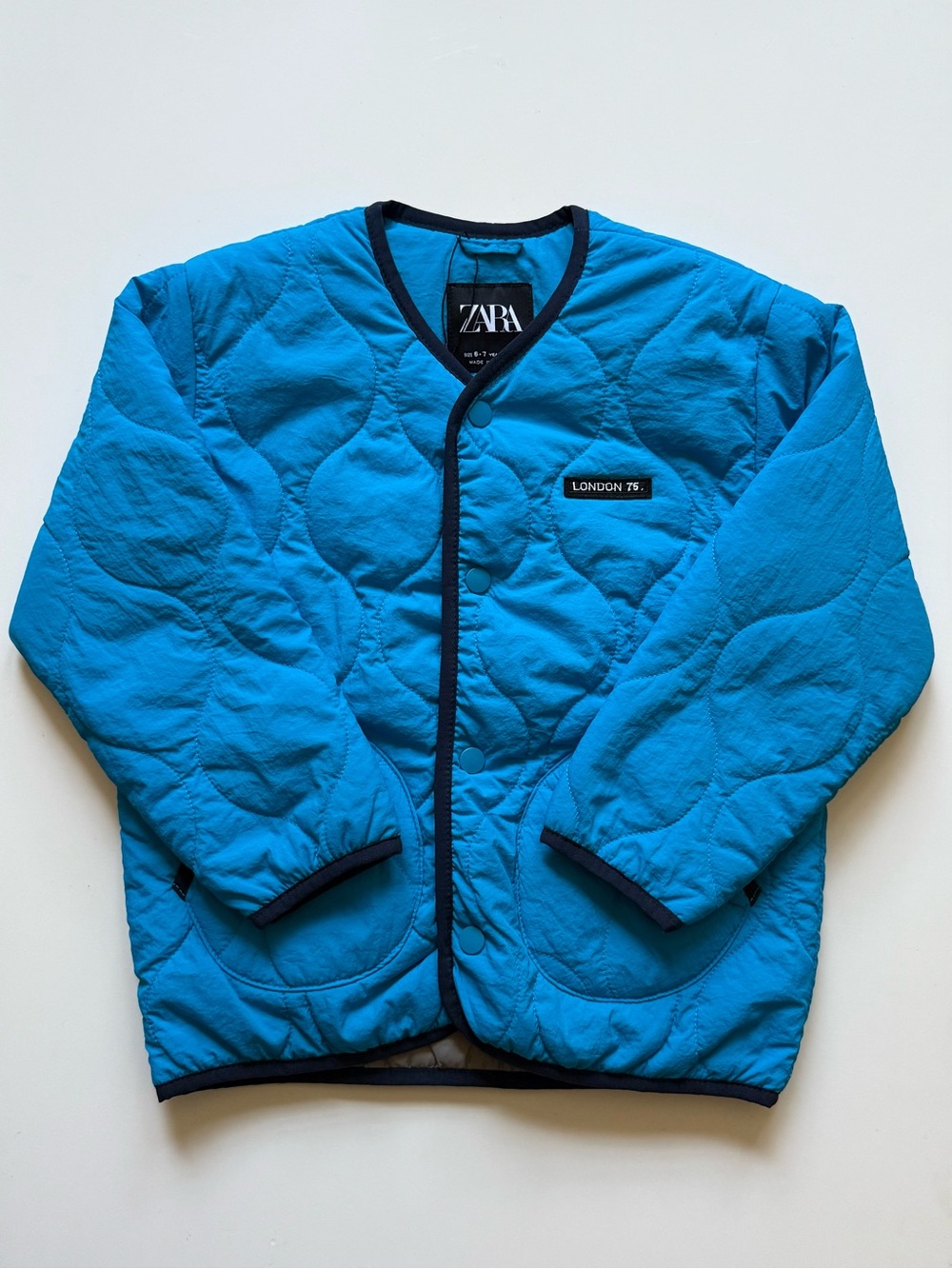 Zara Kids Unisex Quilted Turquoise Jacket with Navy Trim - Size 6-7Y